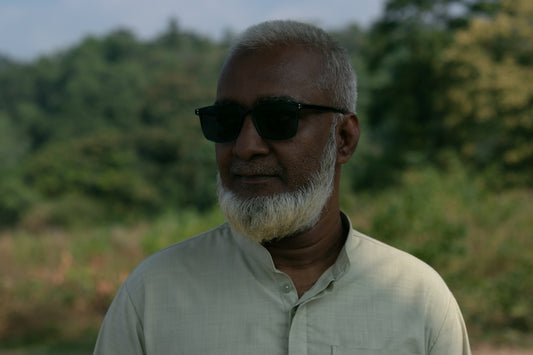 a man with a white beard wearing sunglasses