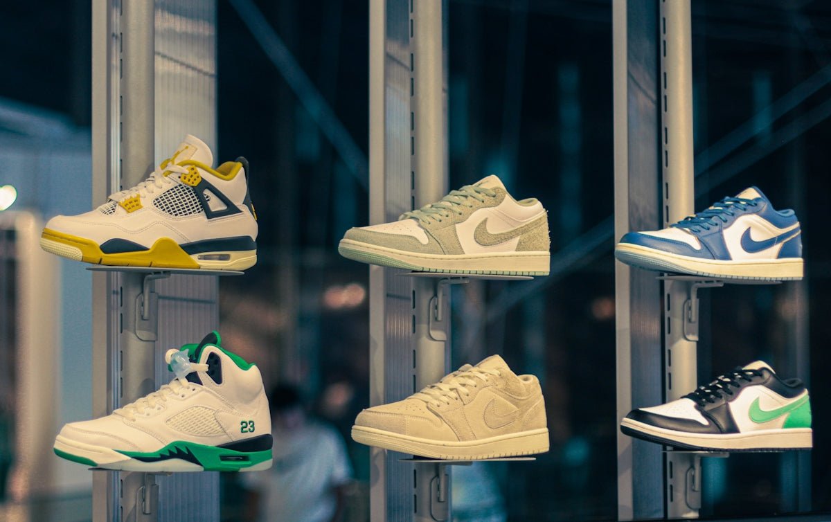 a bunch of shoes that are on a rack