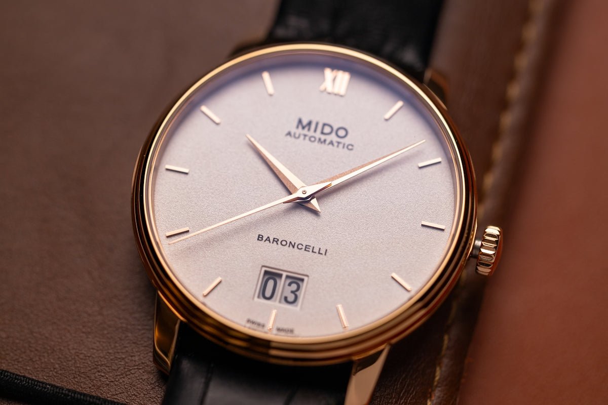 A close-up of a mido baroncelli automatic watch.