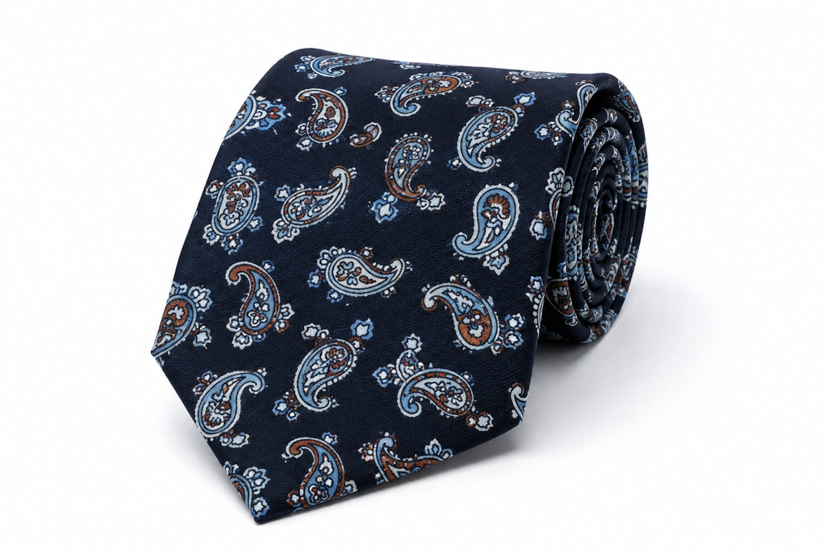 Navy blue tie with a detailed paisley design.